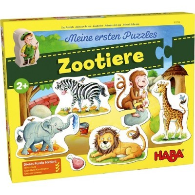 Caixa amarela de puzzle infantil com ilustrações de animais do zoo e texto em alemão.