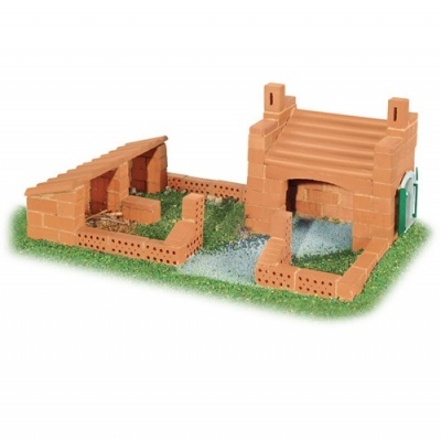 Miniatura de forno a lenha com tijolos vermelhos e base verde