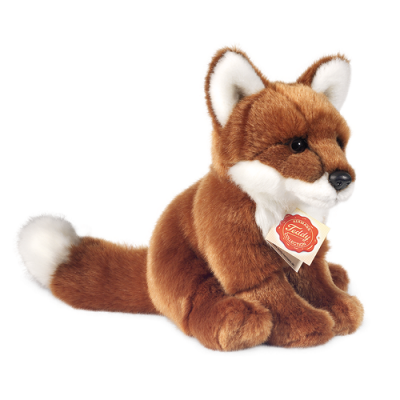 Pelúcia de raposa castanha com detalhes brancos e etiqueta amarela