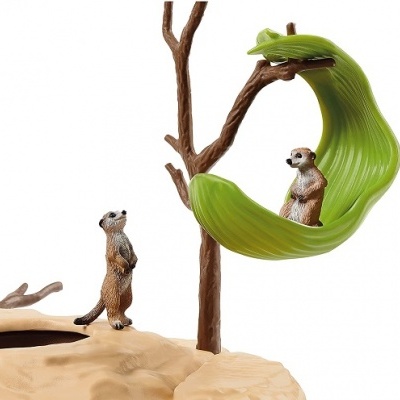 Figuras de meerkats em resina com folha verde e galho castanho
