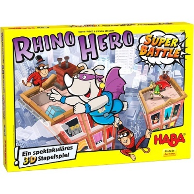 Caixa amarela do jogo 'Rhino Hero Super Battle' com ilustração de rinoceronte heroico e prédios empilhados.