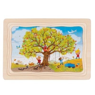 Quebra-cabeças de madeira com ilustração de árvore e crianças a brincar