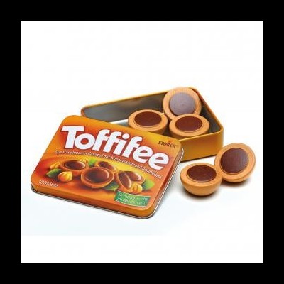 Embalagem e bombons Toffifee em lata laranja