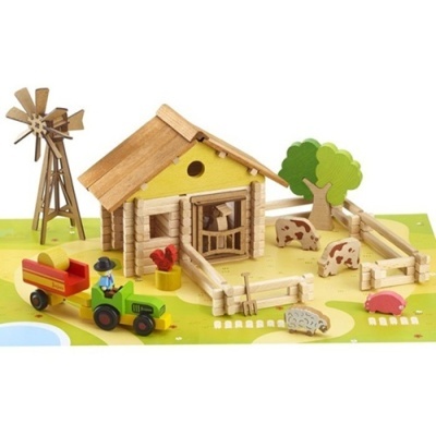 Brinquedo de quinta em madeira com casa, moinho, cercas, trator e animais.