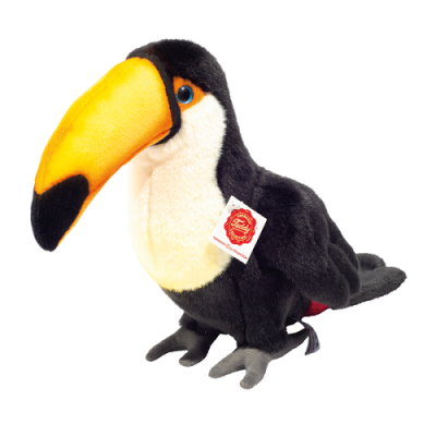 Pelúcia de tucano com grande bico amarelo e preto e corpo preto e branco