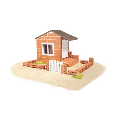 Miniatura de casa de tijolos vermelhos com cerca branca e telhado cinzento