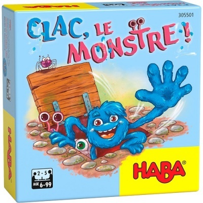 Embalagem do jogo 'CLAC, LE MONSTRE!' com monstro azul e caixa de madeira