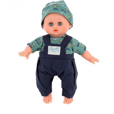 Boneca bebé vestida com camisa verde estampada e calças azuis