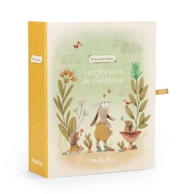 Caixa decorativa com ilustração de coelho e texto em francês