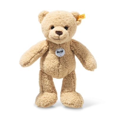 Urso de peluche castanho claro com textura felpuda e etiquetas Steiff