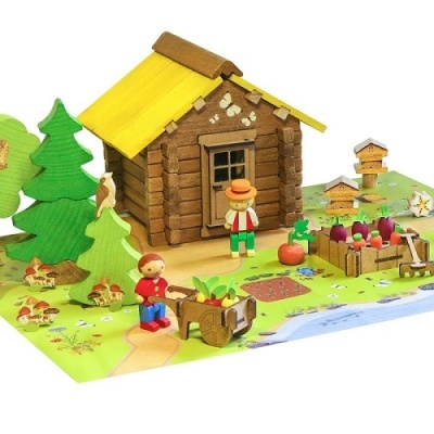 Brinquedo em madeira com casa, figuras humanas, vegetais e árvores