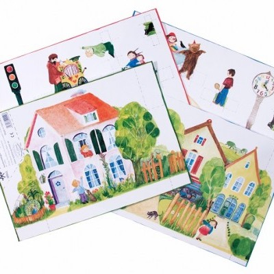 Desenhos coloridos de casas e pessoas em papel