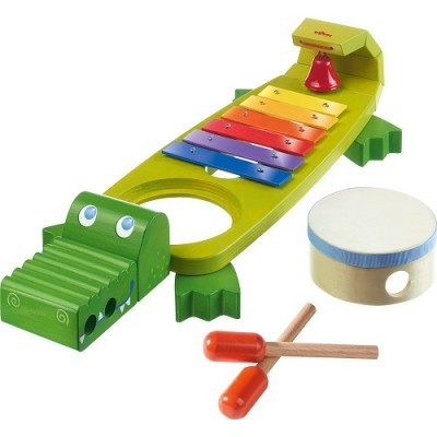 Brinquedo musical infantil em forma de crocodilo com xilofone colorido, tambor e baquetas