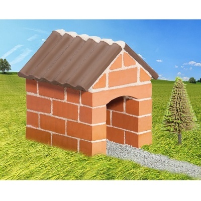 Casota para cães com design de tijolos e telhado castanho num campo verde