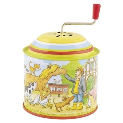 Caixa de música metálica com manivela e ilustração de fazenda