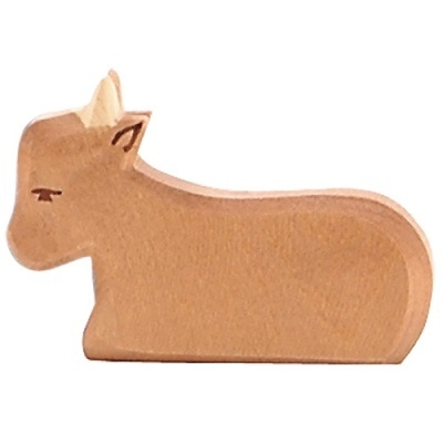 Figura em madeira castanha clara de animal sentado com olhos e orelhas pintados