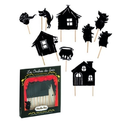 Fantoches de teatro de sombras em silhuetas pretas com embalagem