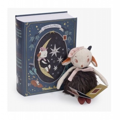 Livro azul ilustrado com peluche de animal segurando livro