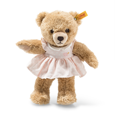 Urso de peluche castanho claro vestido com vestido rosa claro com bolinhas brancas