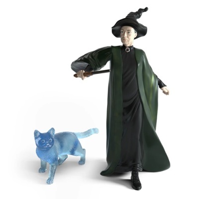 Figuras de uma bruxa com roupa preta e capa verde e um gato azul translúcido