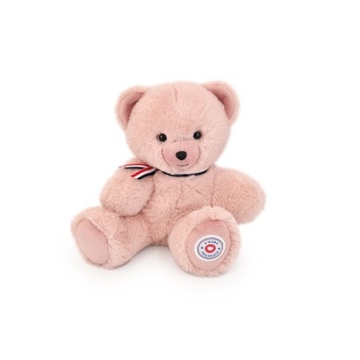 Urso de peluche cor-de-rosa com fita tricolor e etiqueta na pata