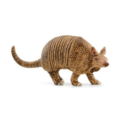 Figura decorativa de tatu castanha com detalhe em escamas