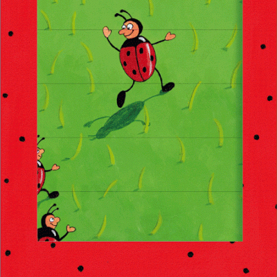 Caixa vermelha com bolinhas pretas e janela transparente mostrando fundo verde com joaninhas desenhadas