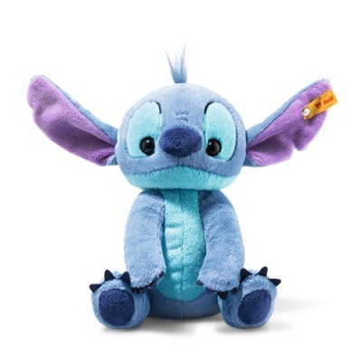 Pelúcia do Stitch azul com orelhas roxas e etiqueta amarela