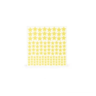 Autocolantes amarelos em forma de estrelas sobre fundo branco