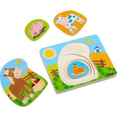 Puzzle de madeira infantil com peças de animais de quinta coloridos