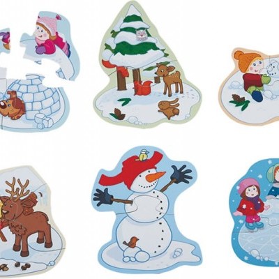 Peças de madeira pintadas com cenas de inverno e Natal, crianças, boneco de neve, árvores e rena.