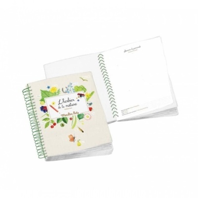 Caderno ilustrado com capa de tecido e espiral verde aberto