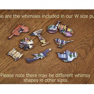 Peças de puzzle de diferentes formas sobre mesa de madeira com texto