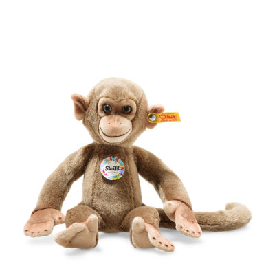 Pelúcia macaco castanha com etiquetas Steiff no peito e na orelha