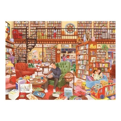 Espaço interior de livraria ou biblioteca com estantes, cadeiras, livros e pessoas a ler