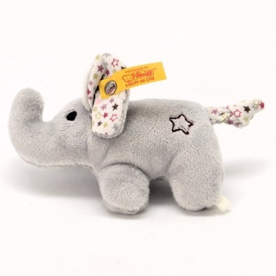Pelúcia elefante cinzenta com orelhas e cauda com padrão de estrelas e etiqueta amarela Steiff