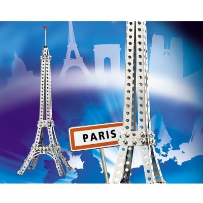 Miniatura metálica da Torre Eiffel com placa Paris em fundo azul