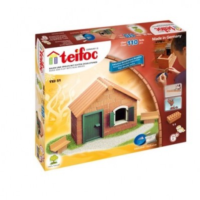 Caixa de brinquedo Teifoc com kit para construir casinha de barro com porta verde e telhado castanho