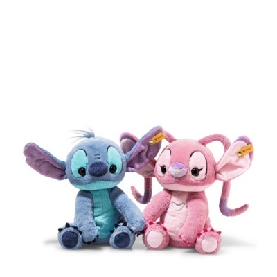 Dois peluches azul e rosa com grandes orelhas