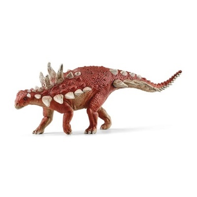 Figura de dinossauro vermelha com saliências brancas