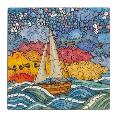 Puzzle com imagem de barco à vela em mar e céu colorido pontilhado