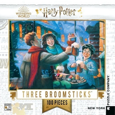Caixa de puzzle Harry Potter com ilustração convivio na neve e texto Three Broomsticks 100 peças