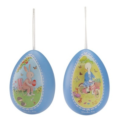 Ornamentos de ovo azuis com ilustrações de coelho e pato