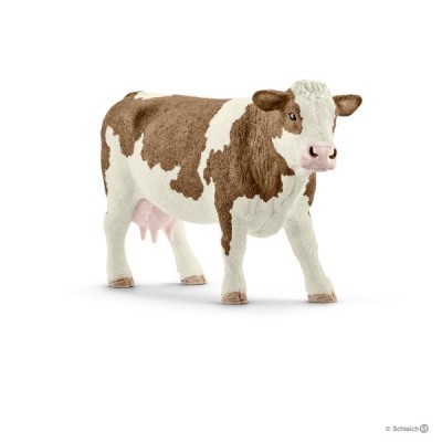 Figura decorativa de vaca castanha e branca sobre fundo branco