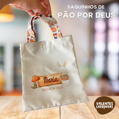 Bolsa de tecido bege claro com ilustração e texto PÃO POR DEUS e Maria