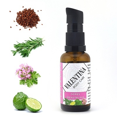 Frasco de vidro âmbar de cuidado corporal Valentinna com ingredientes naturais ao lado