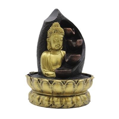 Fonte decorativa com estátua dourada de Buda e cascatas castanhas numa base dourada