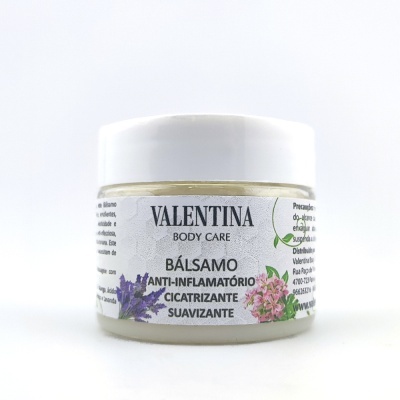 Frasco de bálsamo anti-inflamatório Valentina Body Care com flores no rótulo