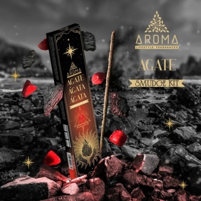 Embalagem preta dourada de kit de incenso Aroma Agate com pedras vermelhas e cinzentas.