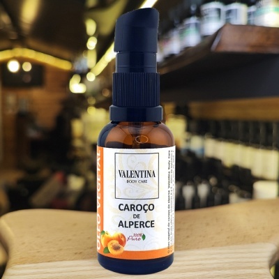 Frasco vidro âmbar com doseador azul e rótulo branco e laranja